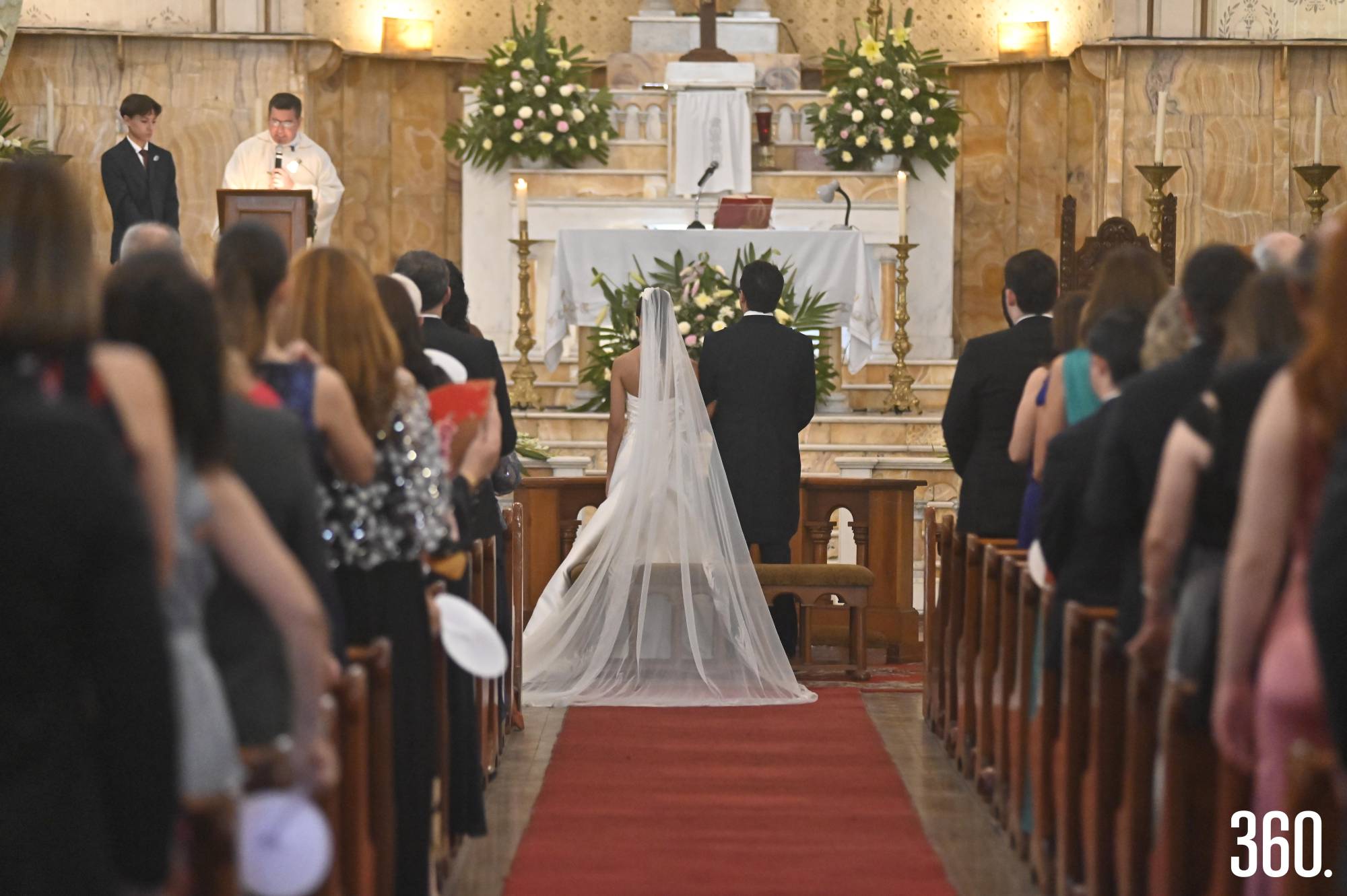 $!Los novios durante la ceremonia religiosa.