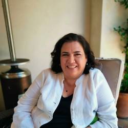 Lic. Adriana Riddle de los Santos