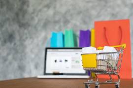 laptop and shopping bags, online shopping concept.