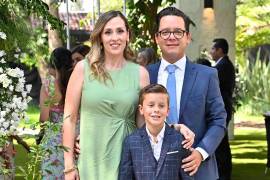 Ricky con sus papás, Ricardo Dávila y Montse Suárez.