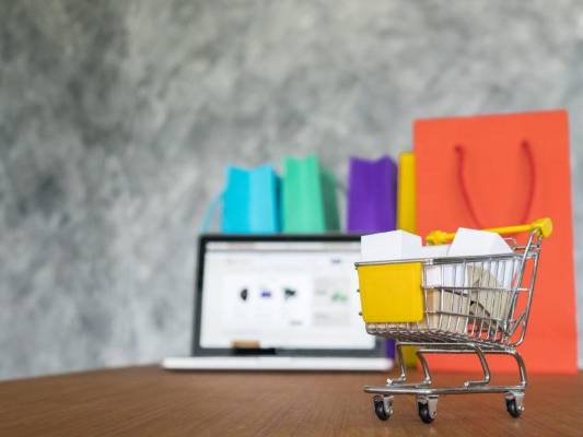 laptop and shopping bags, online shopping concept.
