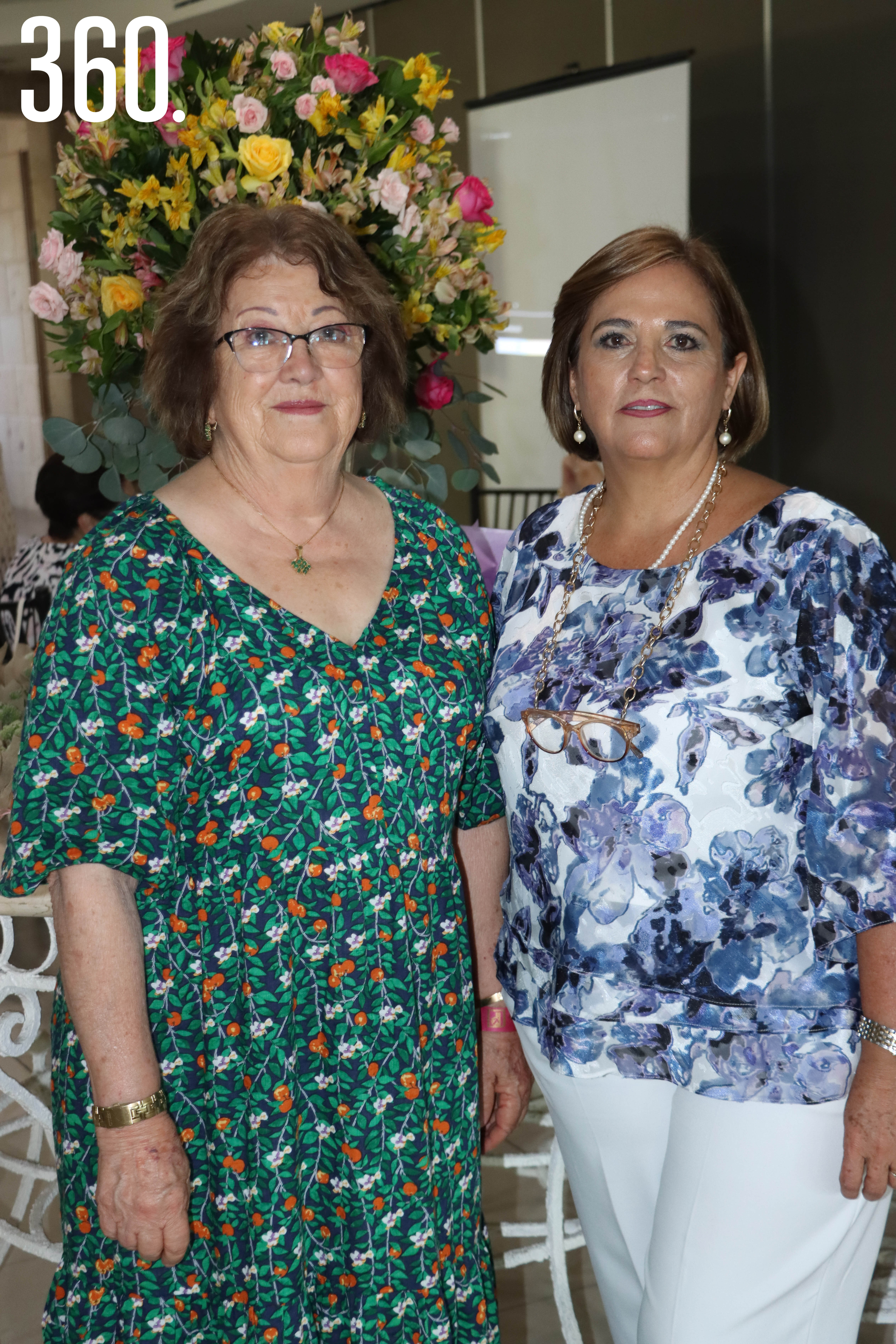 Margarita Dávila y Charis Oyervides, presidentas salientes.